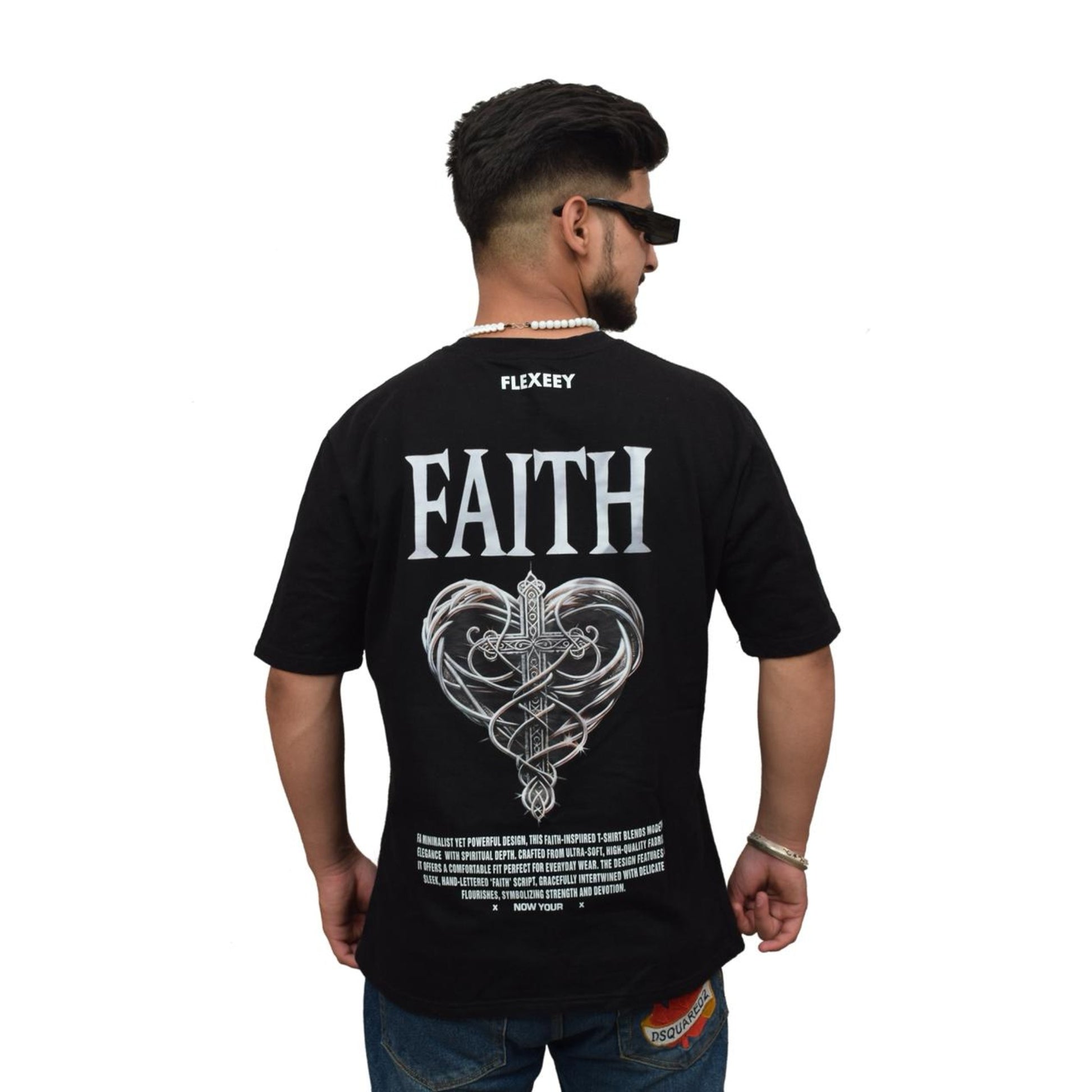 Man wearing a black t-shirt with 'FAITH' and a heart design on the back, brand 'FLEXEEY' visible.